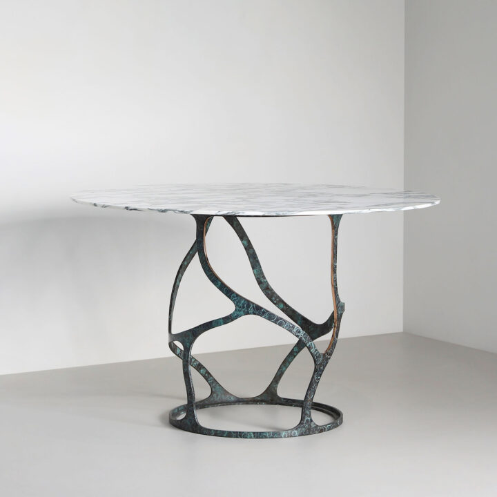 Made from bronze finished in "Bottle Green" patina with Arabescato marble top