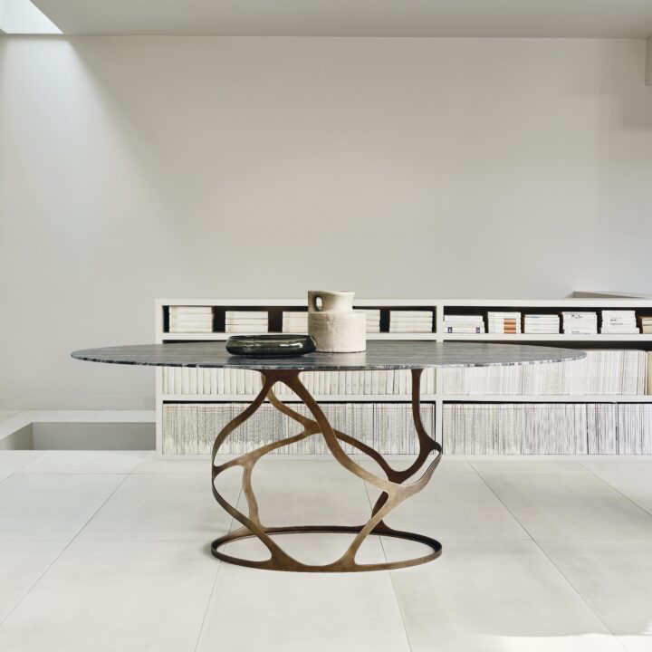 Papillon Oval Dining Table in Rose Pewter with a Silver Wave marble top