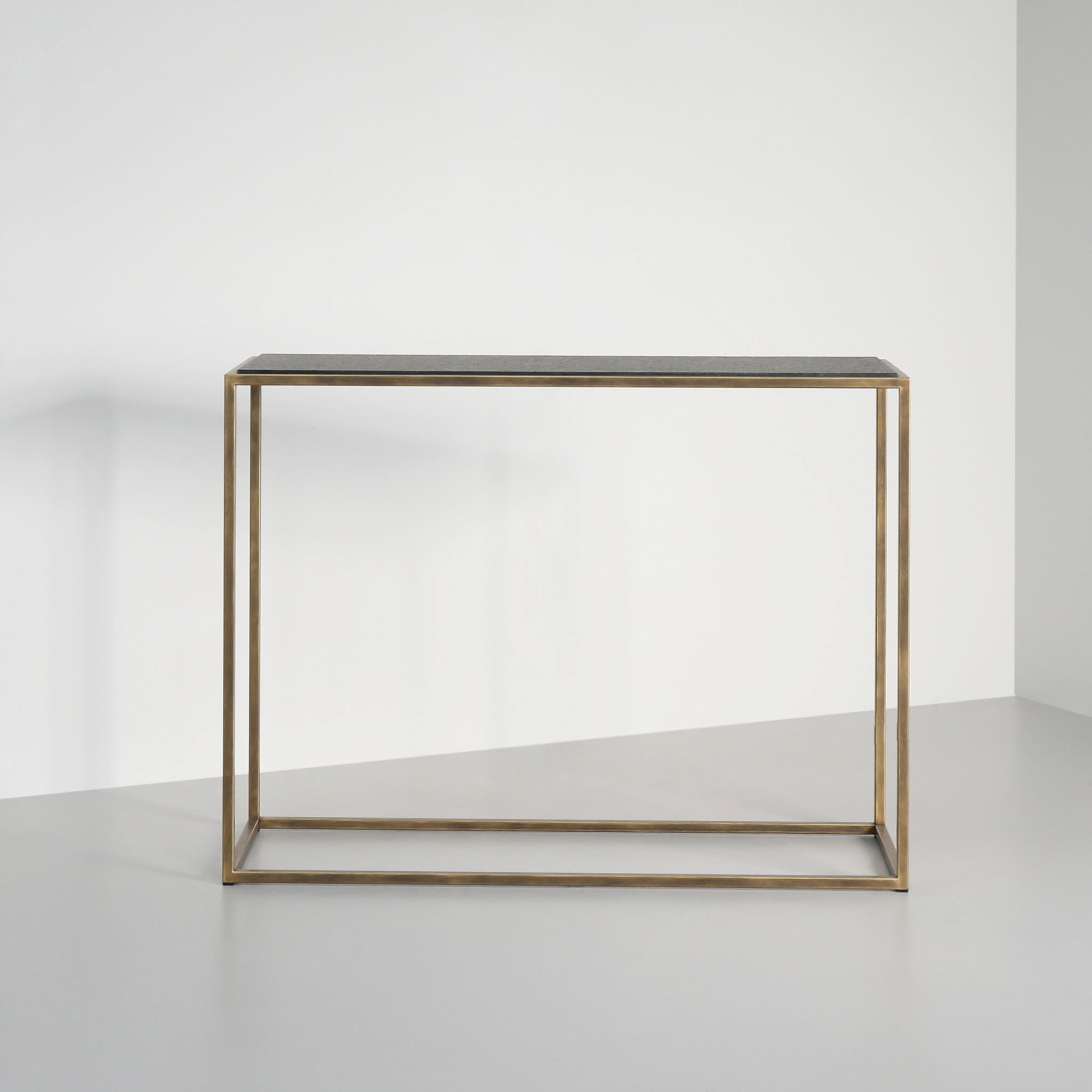 Finished in "Florentine Gold" with black granite top