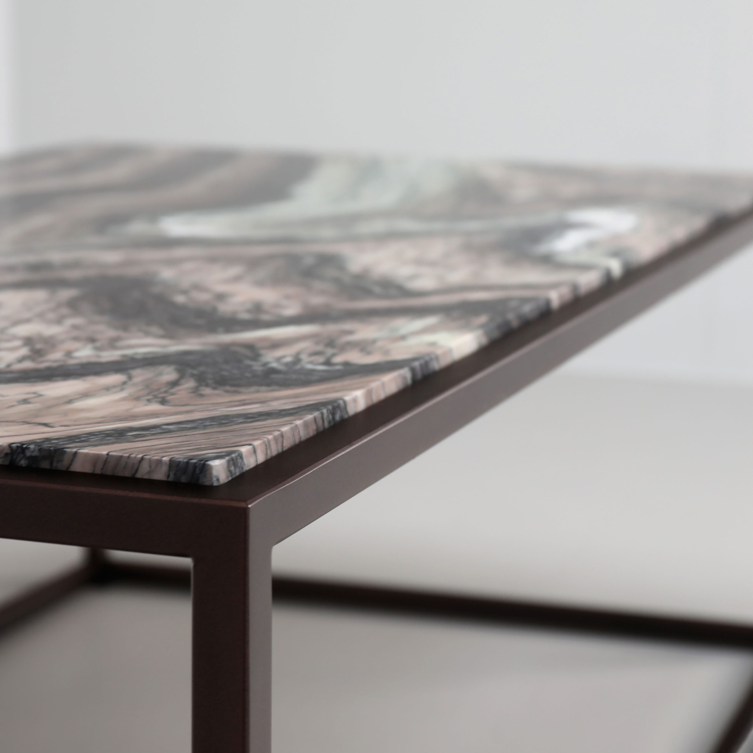 Finished in "Bronze" with a Rosso Luana Verde marble top