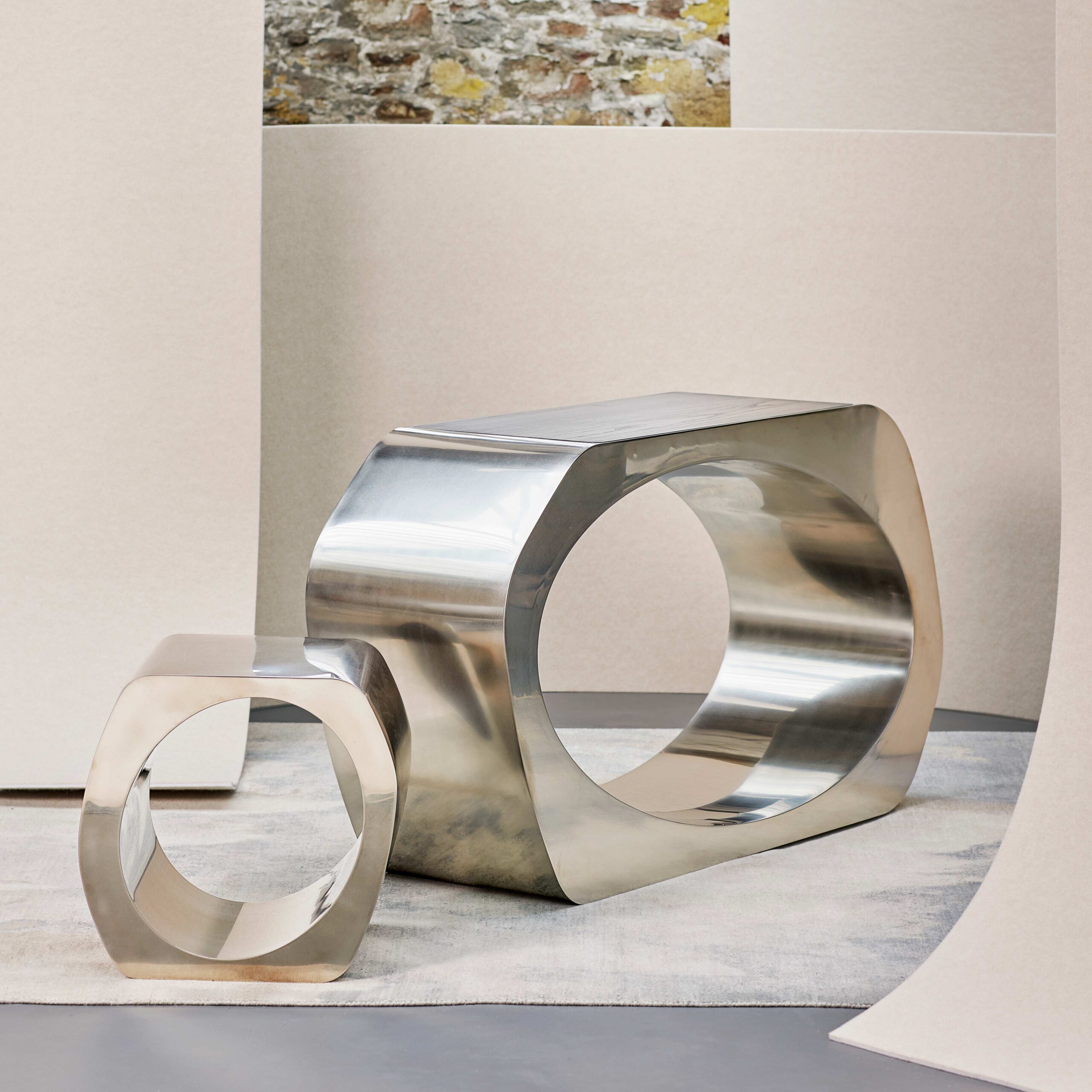 Made in stainless steel
with a satin polish, and an ebonised oak top