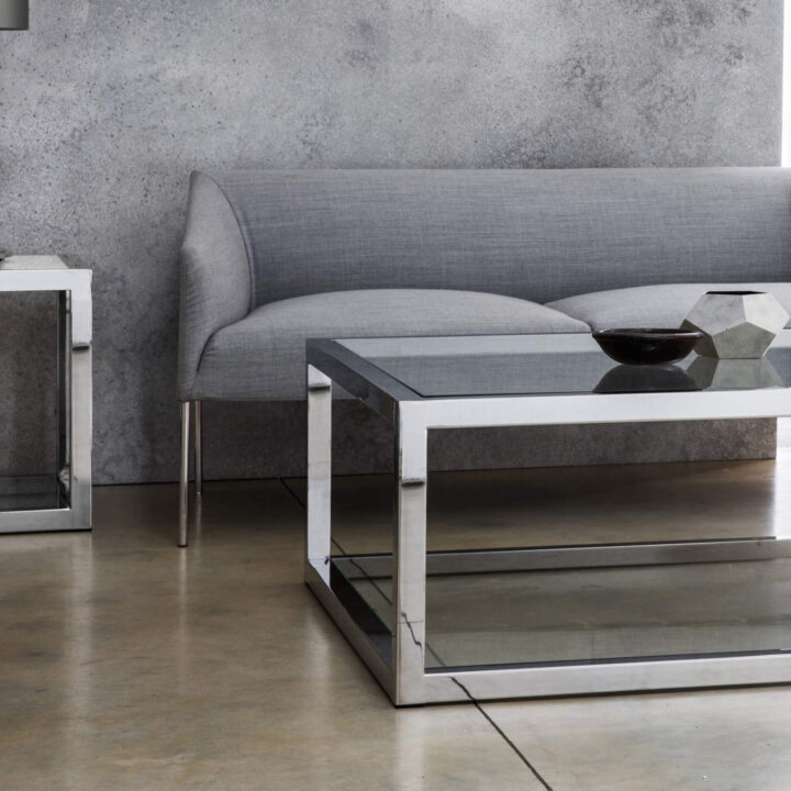 Finished in Polished stainless steel with a smoked grey glass top