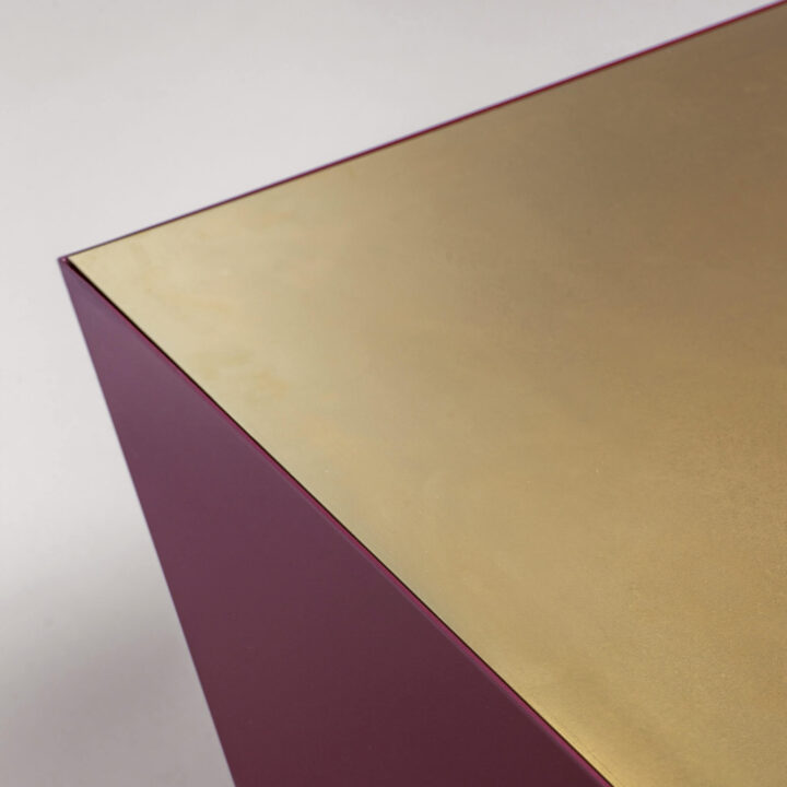 Finished in "Bridge Red" with a Gold Plated top