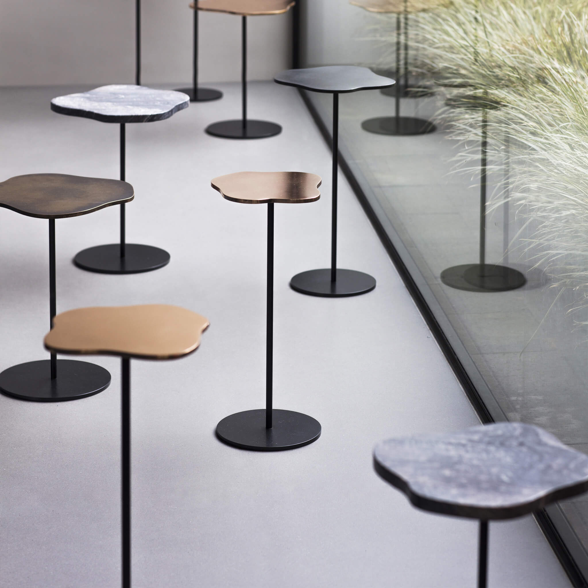 Finished in "Anthracite" with various marble and metal tops