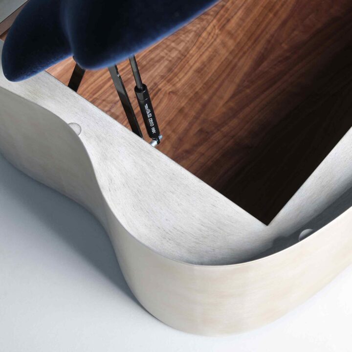 Finished in "Moon Silver" with navy mohair velvet upholstery